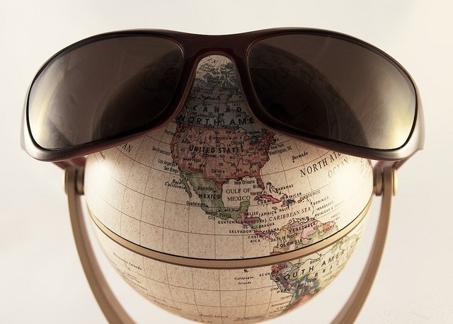 sunglasses on a globe