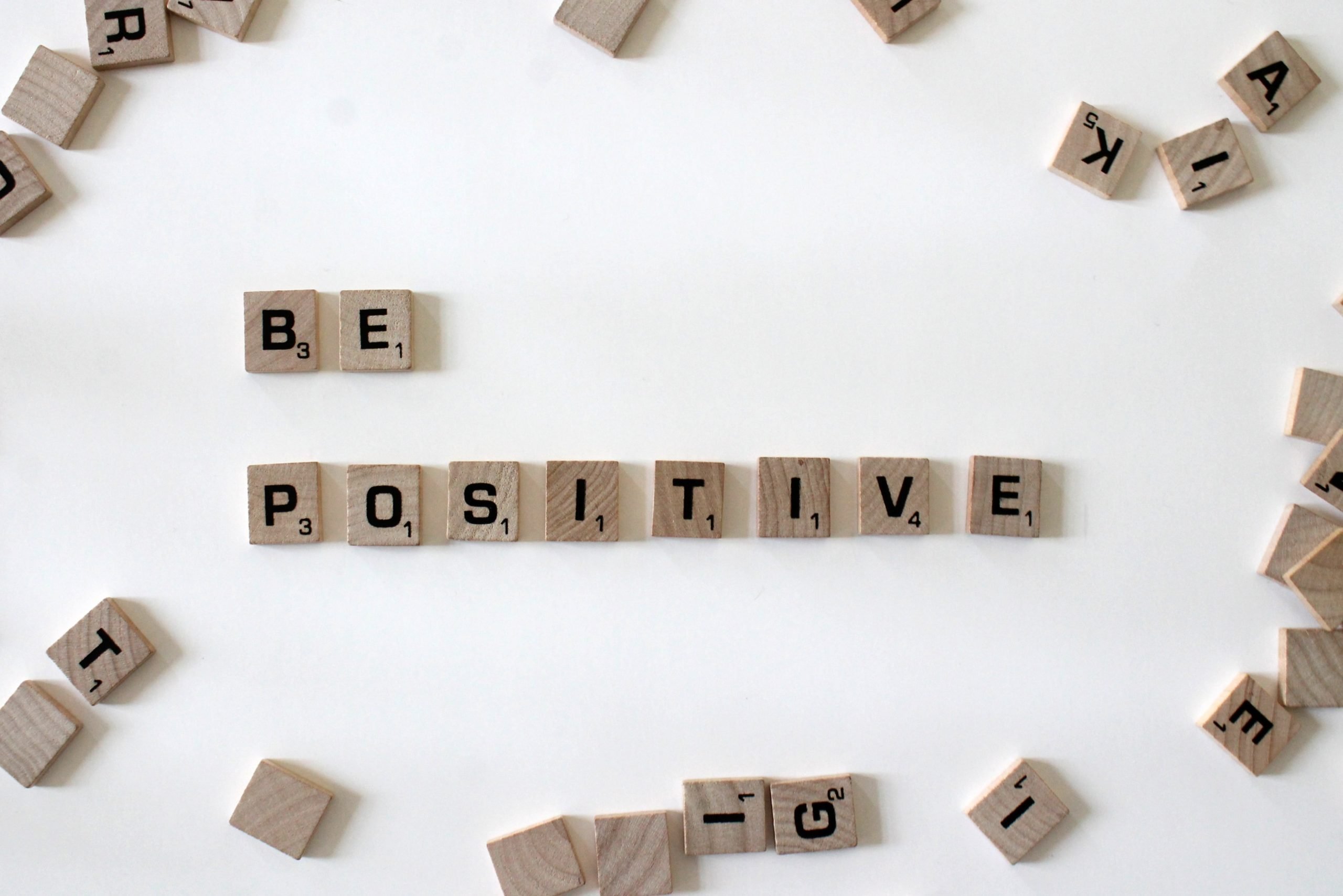 scrabble letters saying be positive